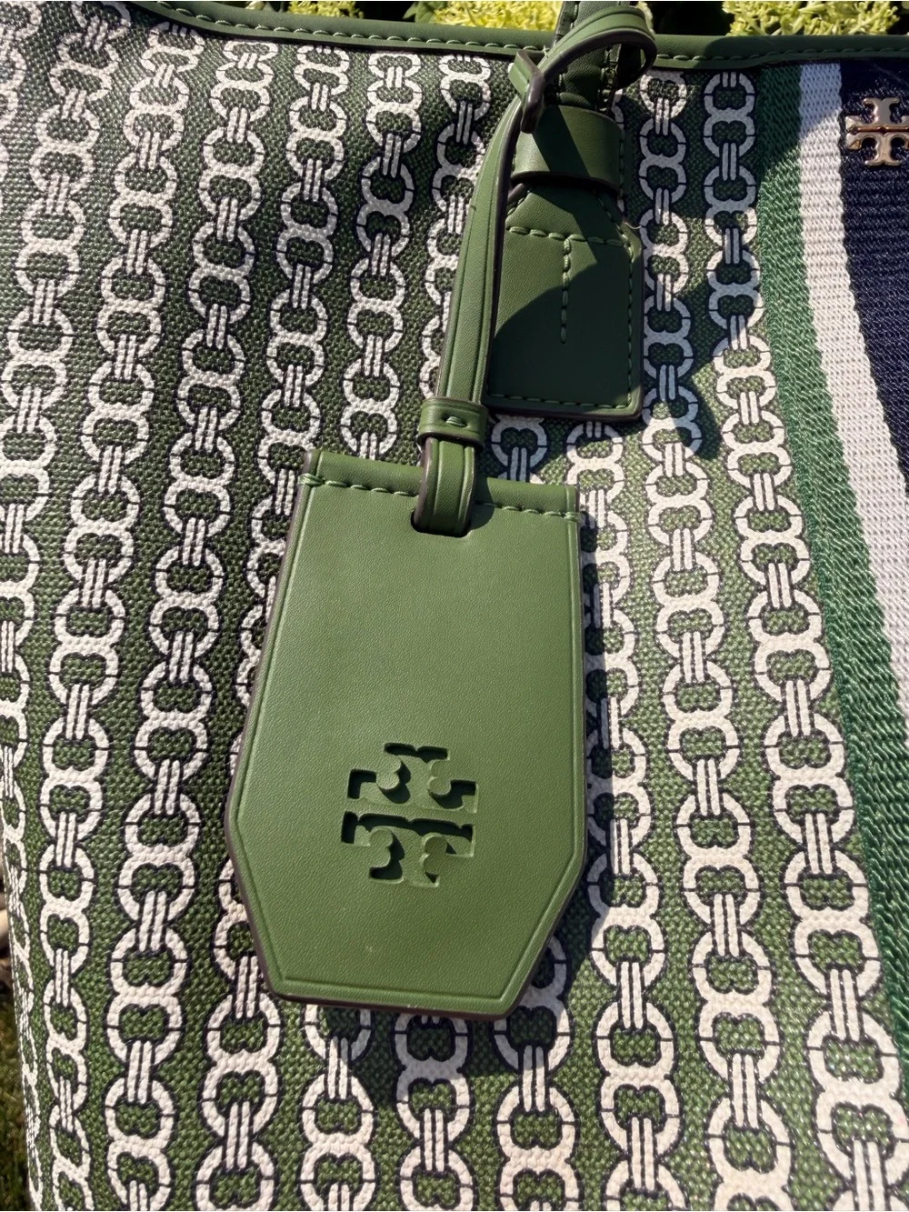Tory Burch Green Tote Bag with Chain-Patterned Canvas and Stripe Detail.